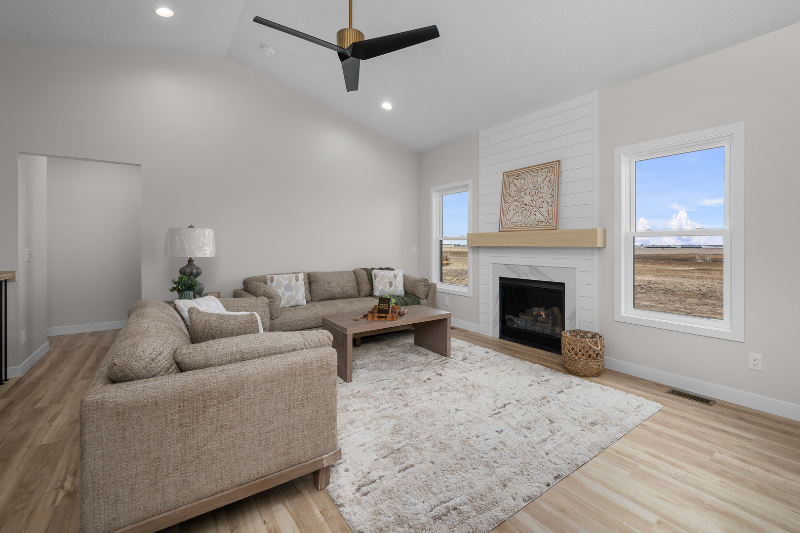 1832 Redbud Circle Eldridge, IA 52748 - Photo 4 of 35 a living room with furniture and a fireplace