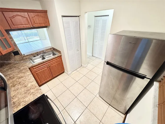 $164,900 | 2800 Riverside Drive, Unit 2011, Coral Springs, FL 33065