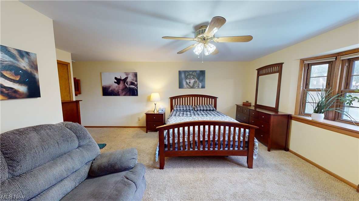 1243 Yellowstone Road Cleveland, OH 44121 - Photo 16 of 28 Carpeted bedroom with ceiling fan