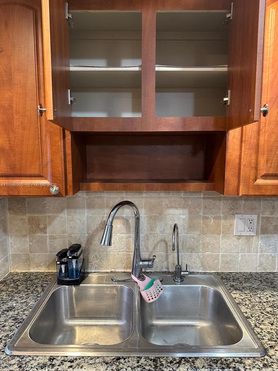 9848 Marina Boulevard, Unit 811 Boca Raton, FL 33428 - Photo 10 of 86 Cabinet above the sink