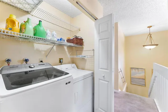 a kitchen that has a sink and a stove