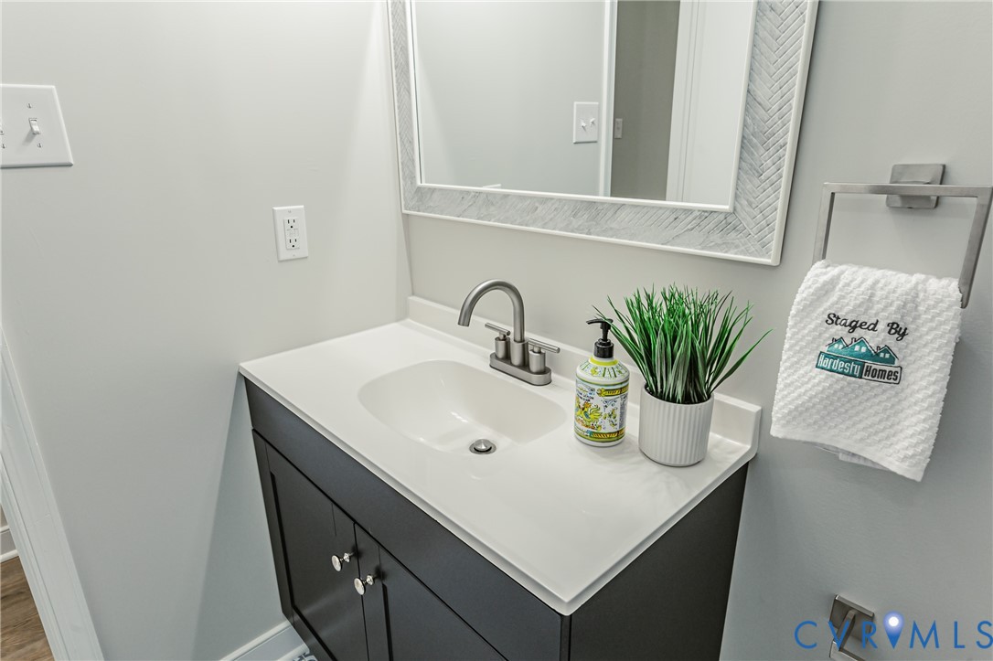 11251 Celtic Road Chesterfield, VA 23838 - Photo 23 of 49 a bathroom with a sink and a mirror