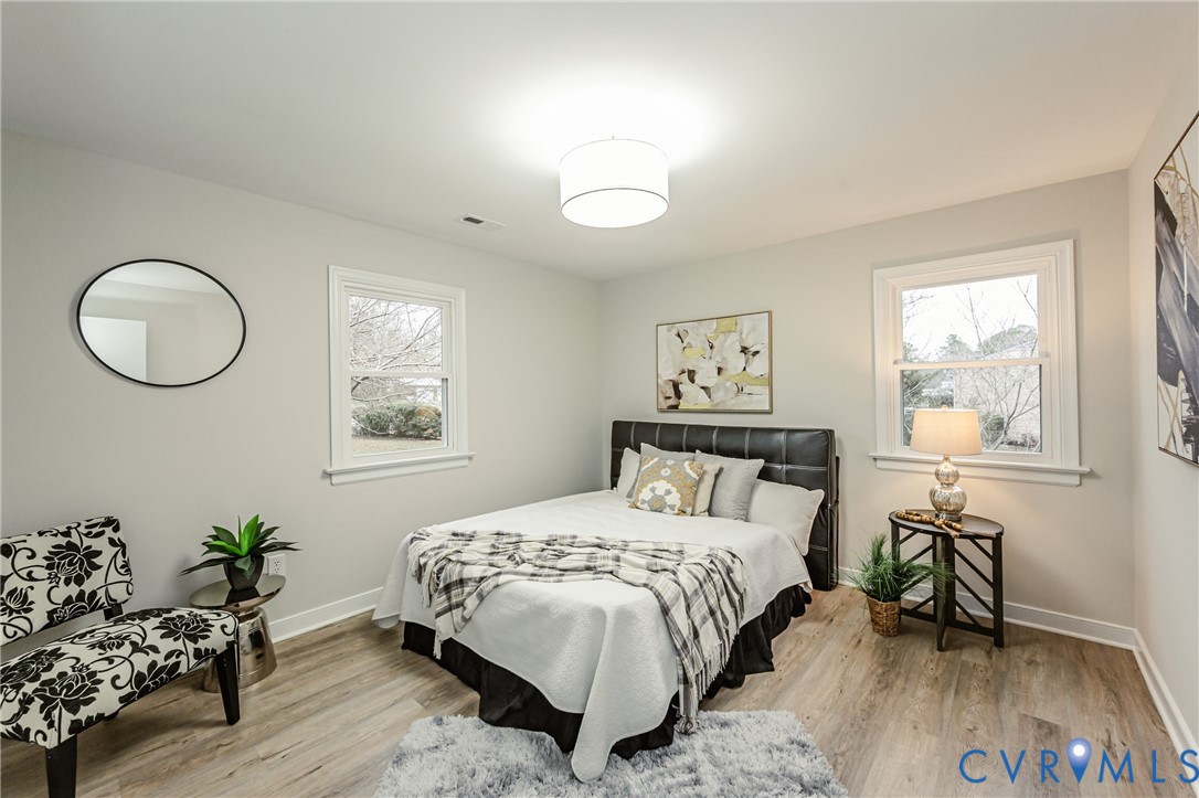 11251 Celtic Road Chesterfield, VA 23838 - Photo 26 of 49 a bedroom with a bed and a table