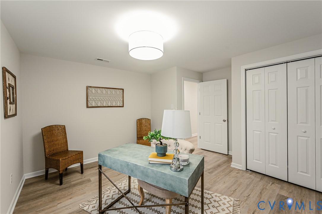 11251 Celtic Road Chesterfield, VA 23838 - Photo 39 of 49 a view of a workspace with furniture and wooden floor