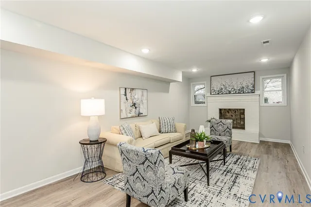 a view of a house with a wooden deck