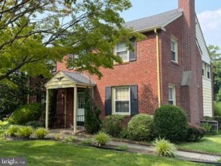 2635 Springfield Road Broomall, PA 19008 - Photo 1 of 24 a front view of a house with garden