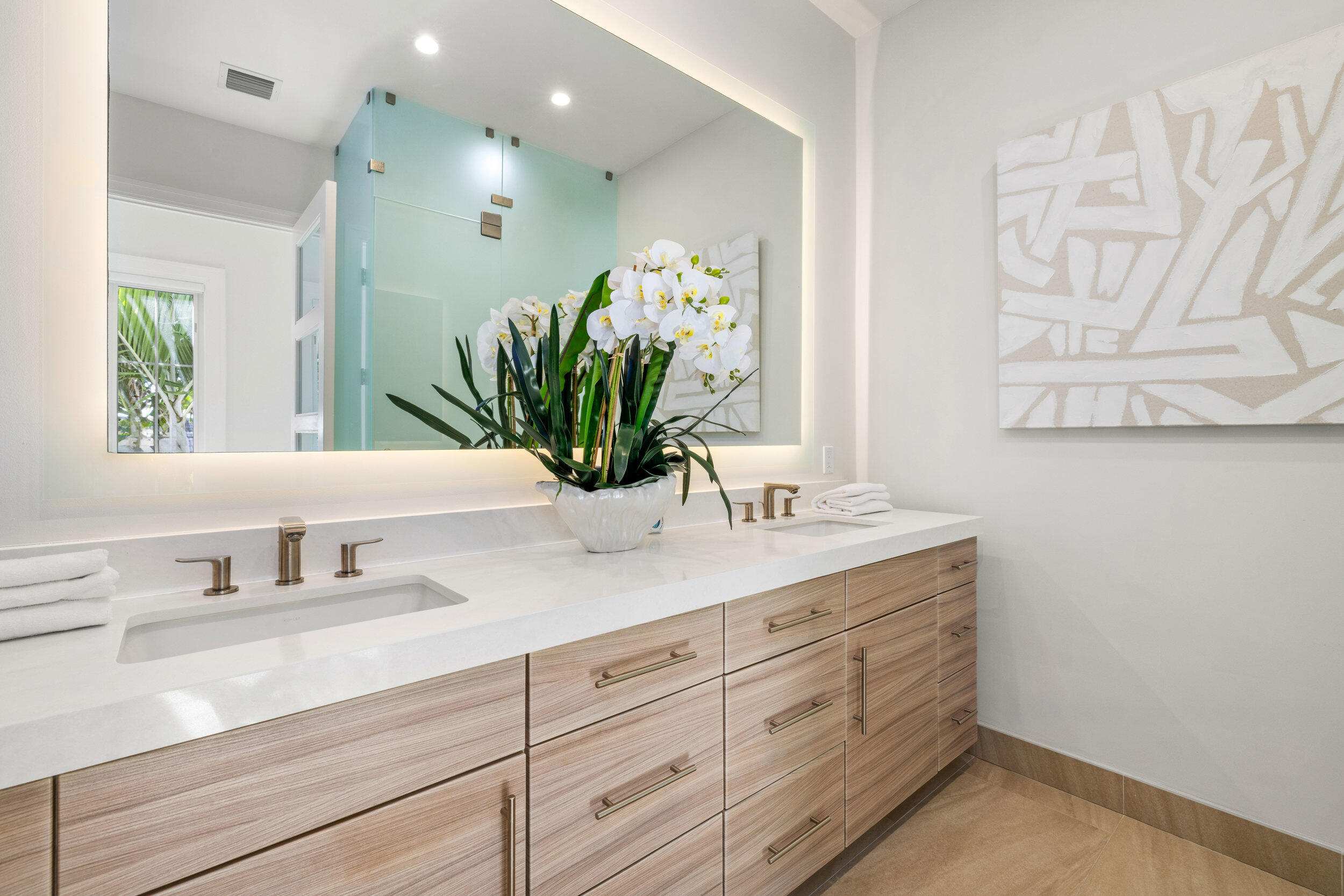 17 Adams Road Ocean Ridge, FL 33435 - Photo 18 of 41 a bathroom with a granite countertop sink a mirror and a potted plant