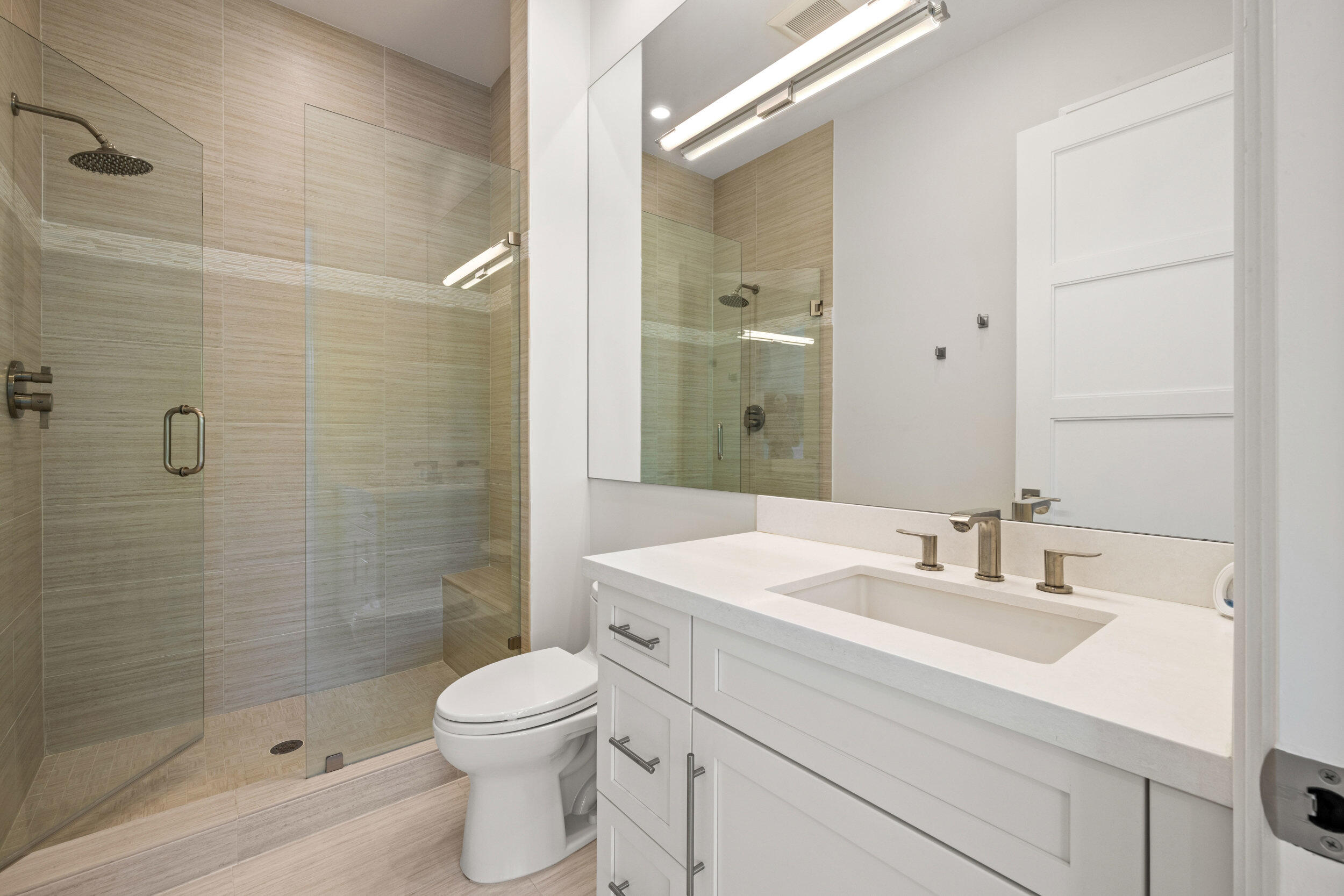 17 Adams Road Ocean Ridge, FL 33435 - Photo 23 of 41 a bathroom with a sink a toilet and shower