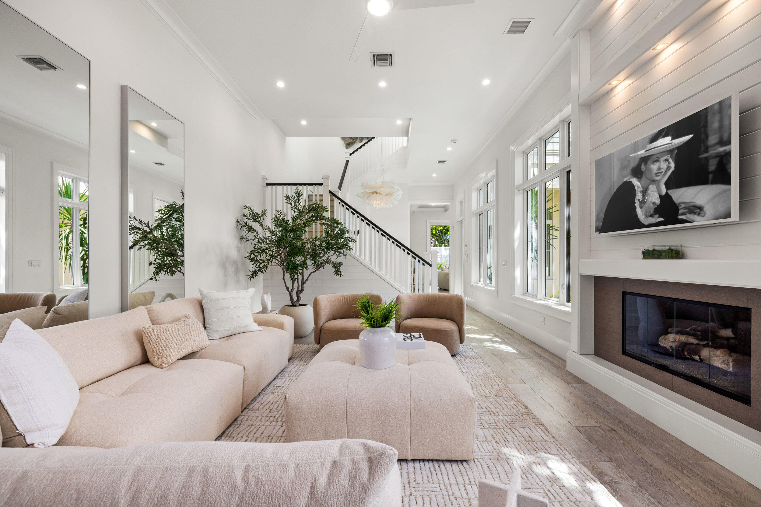 17 Adams Road Ocean Ridge, FL 33435 - Photo 4 of 41 a living room with furniture fireplace and flat screen tv