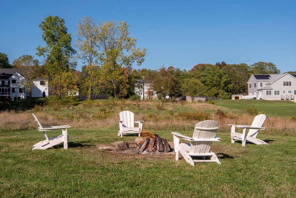 5 John West Road Exeter, NH 03833 - Photo 30 of 33 a view of a lake with outdoor seating