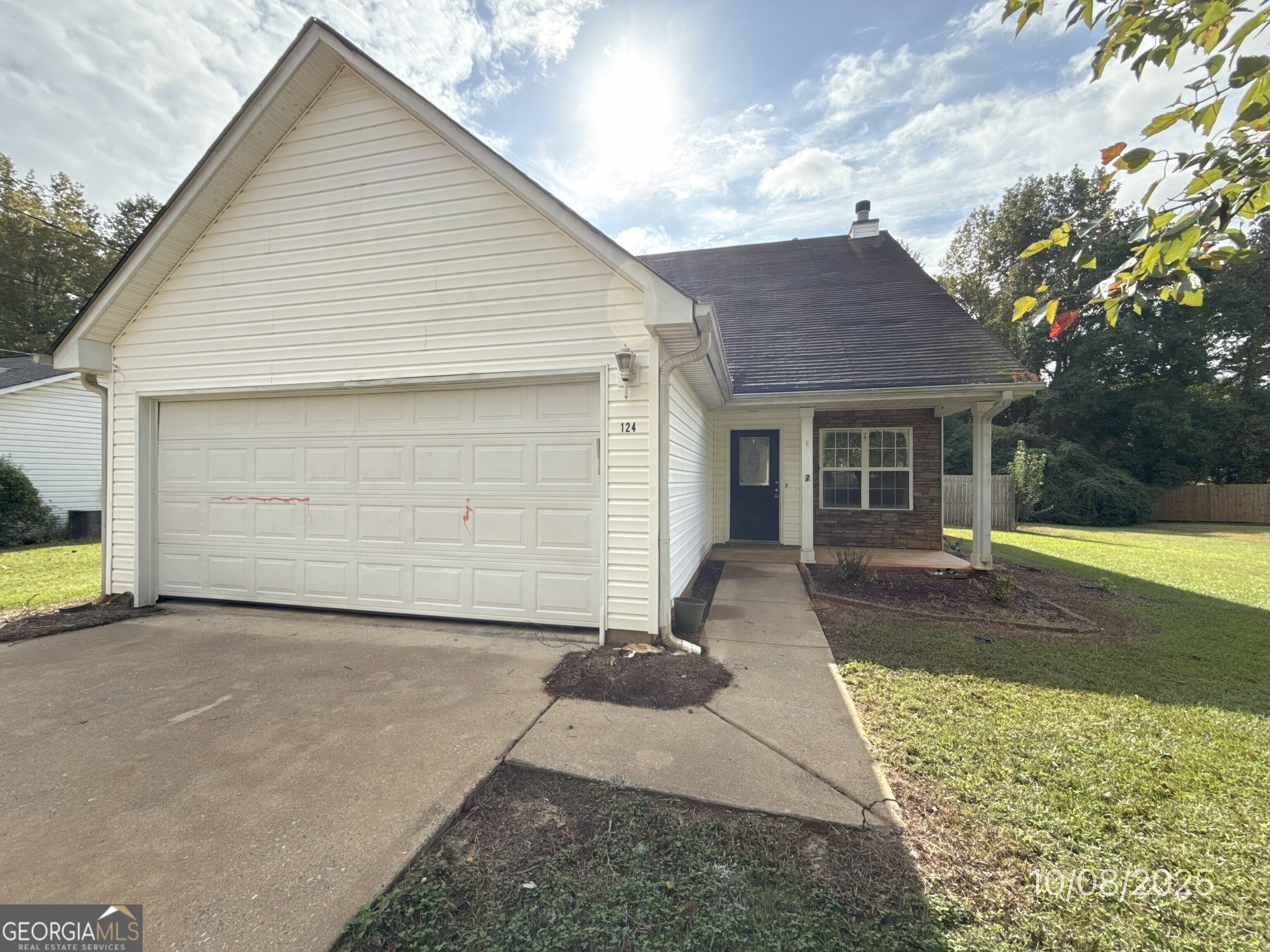 124 Waters Edge Drive Locust Grove, GA 30248 - Photo 1 of 13 a front view of house with yard