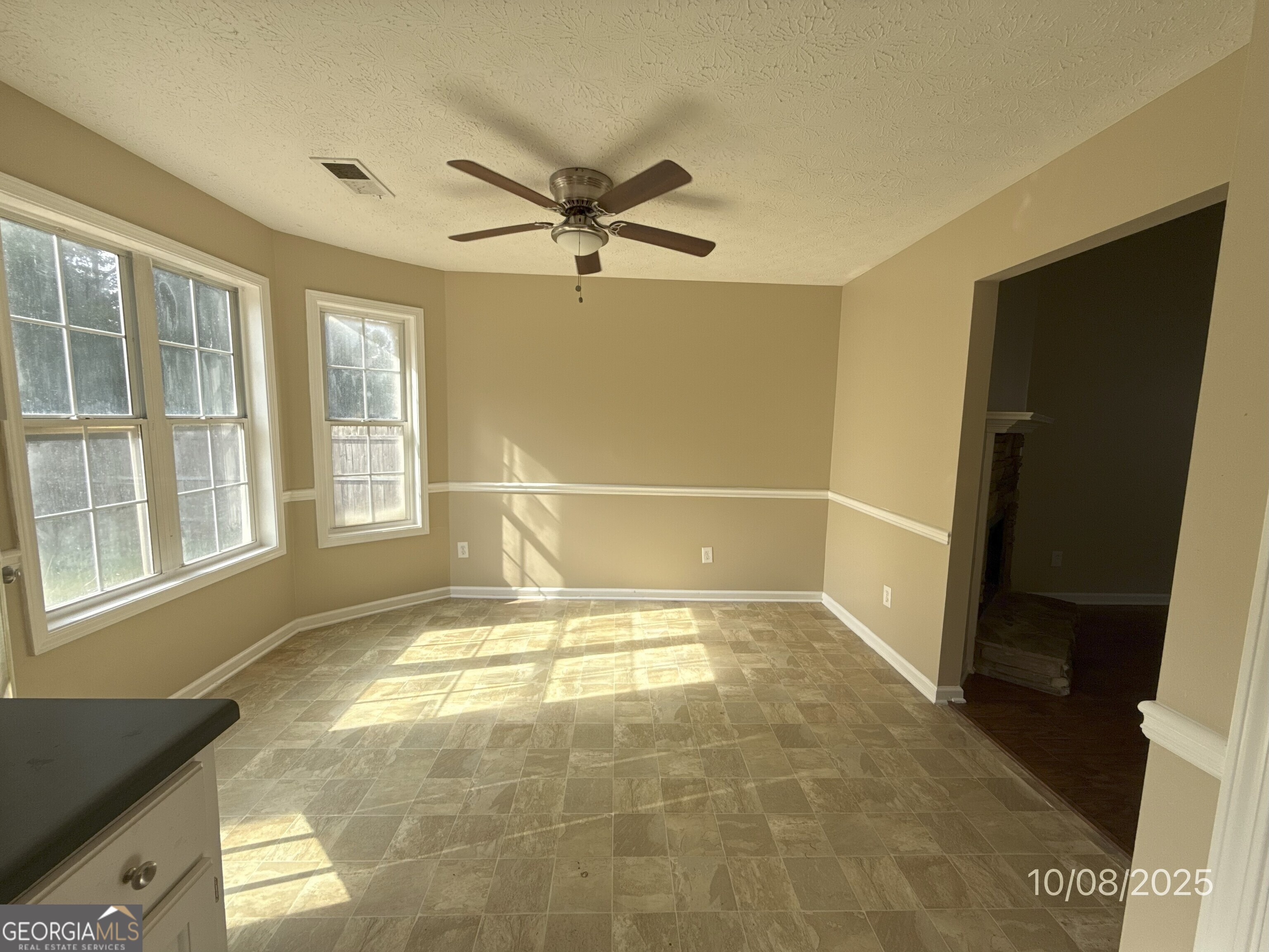 124 Waters Edge Drive Locust Grove, GA 30248 - Photo 7 of 13 a view of an empty room with a window