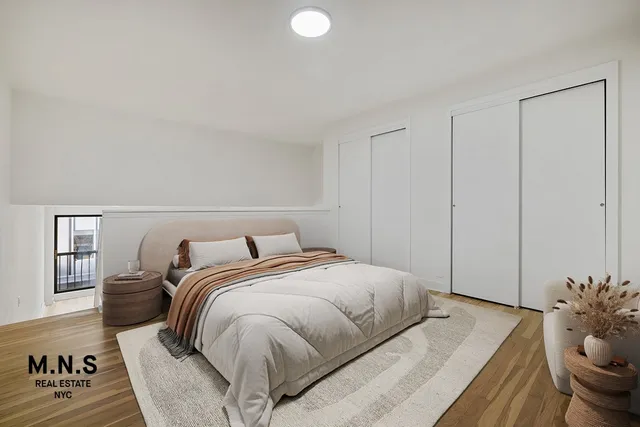a kitchen with cabinets appliances a sink and a counter top