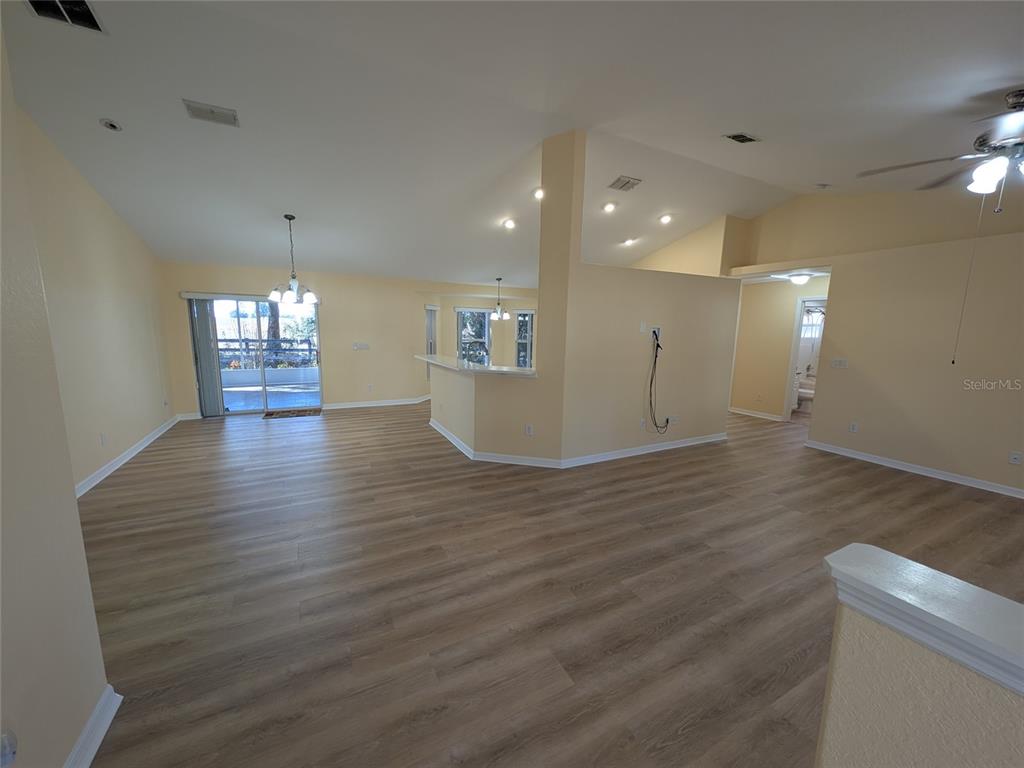 9573 Southwest 53rd Circle Ocala, FL 34476 - Photo 14 of 85 a view of empty room with wooden floor