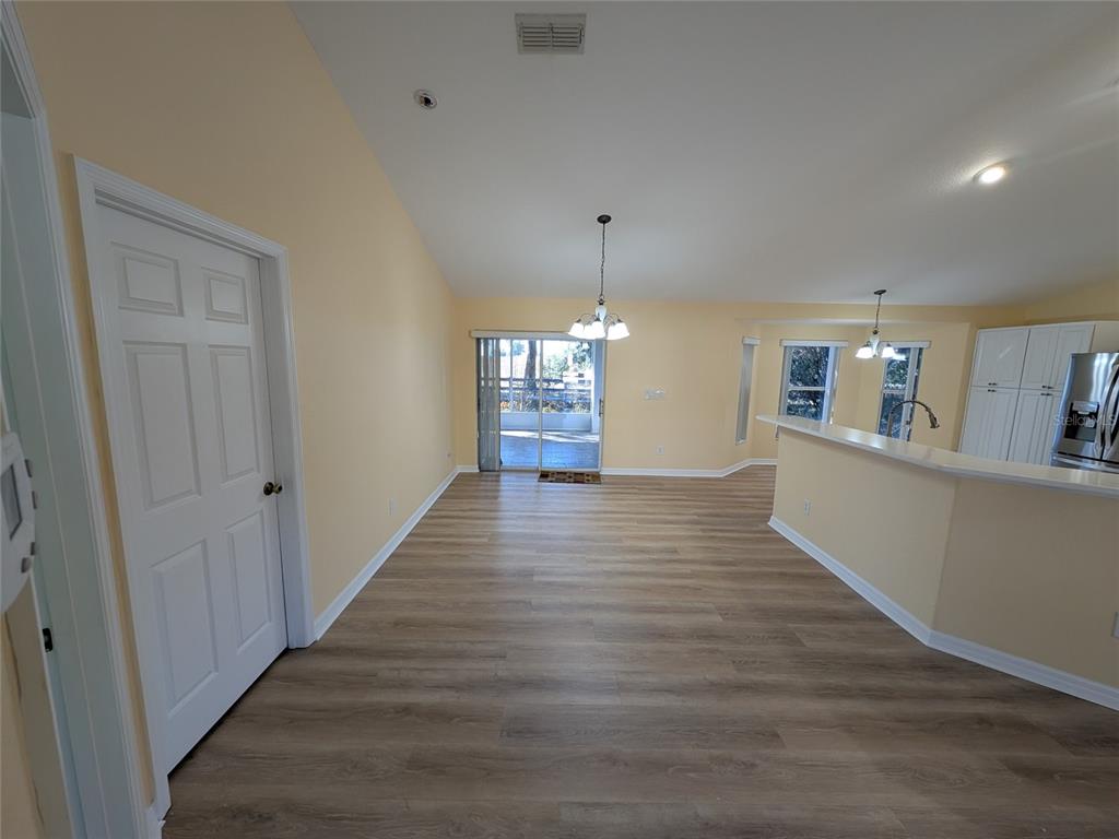 9573 Southwest 53rd Circle Ocala, FL 34476 - Photo 15 of 85 a view of a kitchen and wooden floor