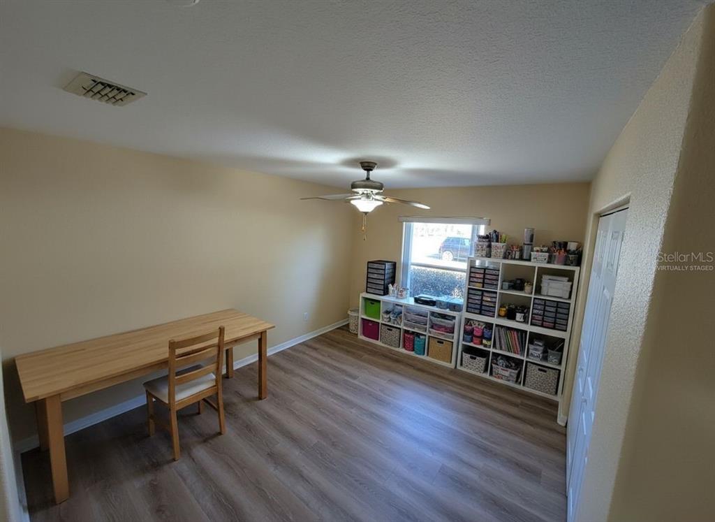 9573 Southwest 53rd Circle Ocala, FL 34476 - Photo 54 of 85 a view of a workspace with furniture