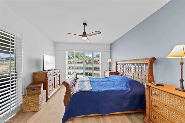 a bathroom with a shower sink and mirror