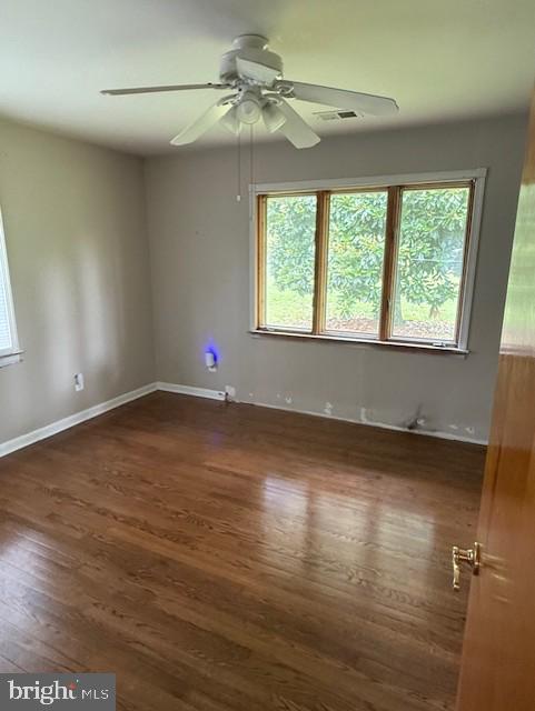 13342 Marsh Road Bealeton, VA 22712 - Photo 18 of 25 an empty room with wooden floor and windows