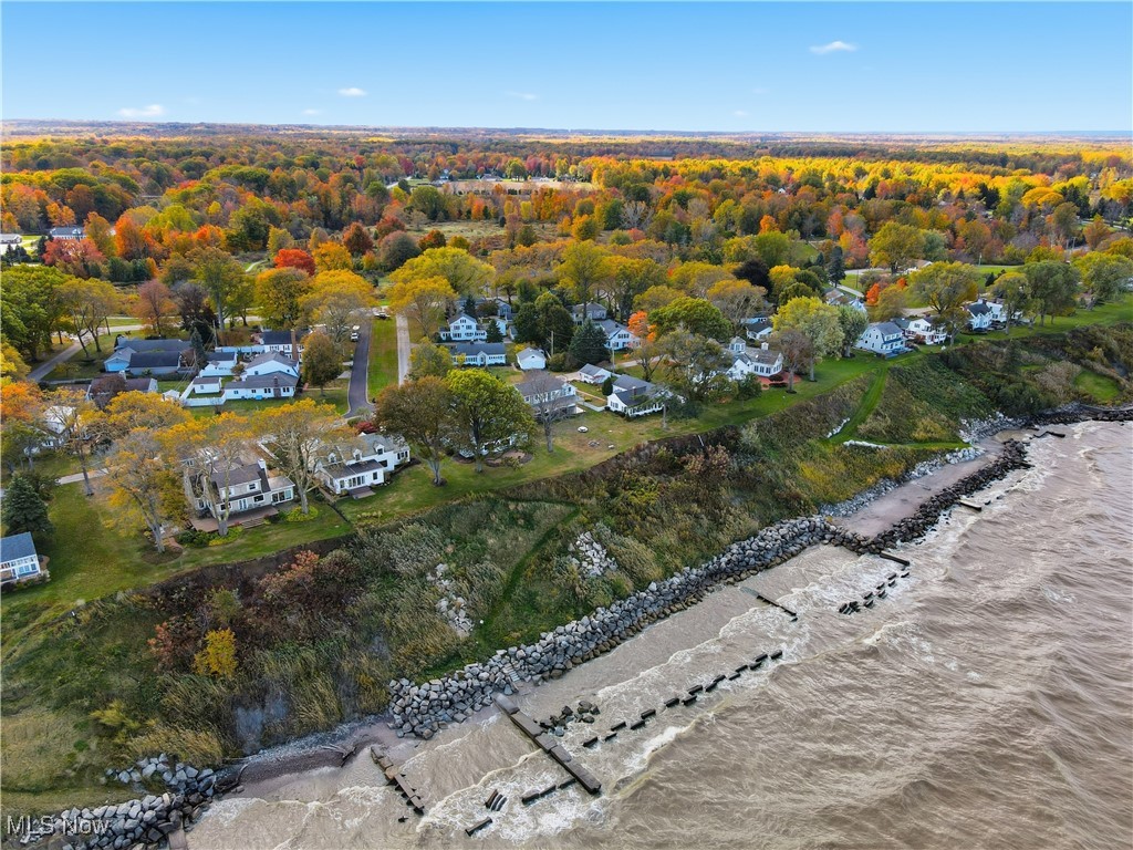 4441 Lake Road West Ashtabula, OH 44004 - Photo 46 of 46 Drone / aerial view of a large body of water and a forest