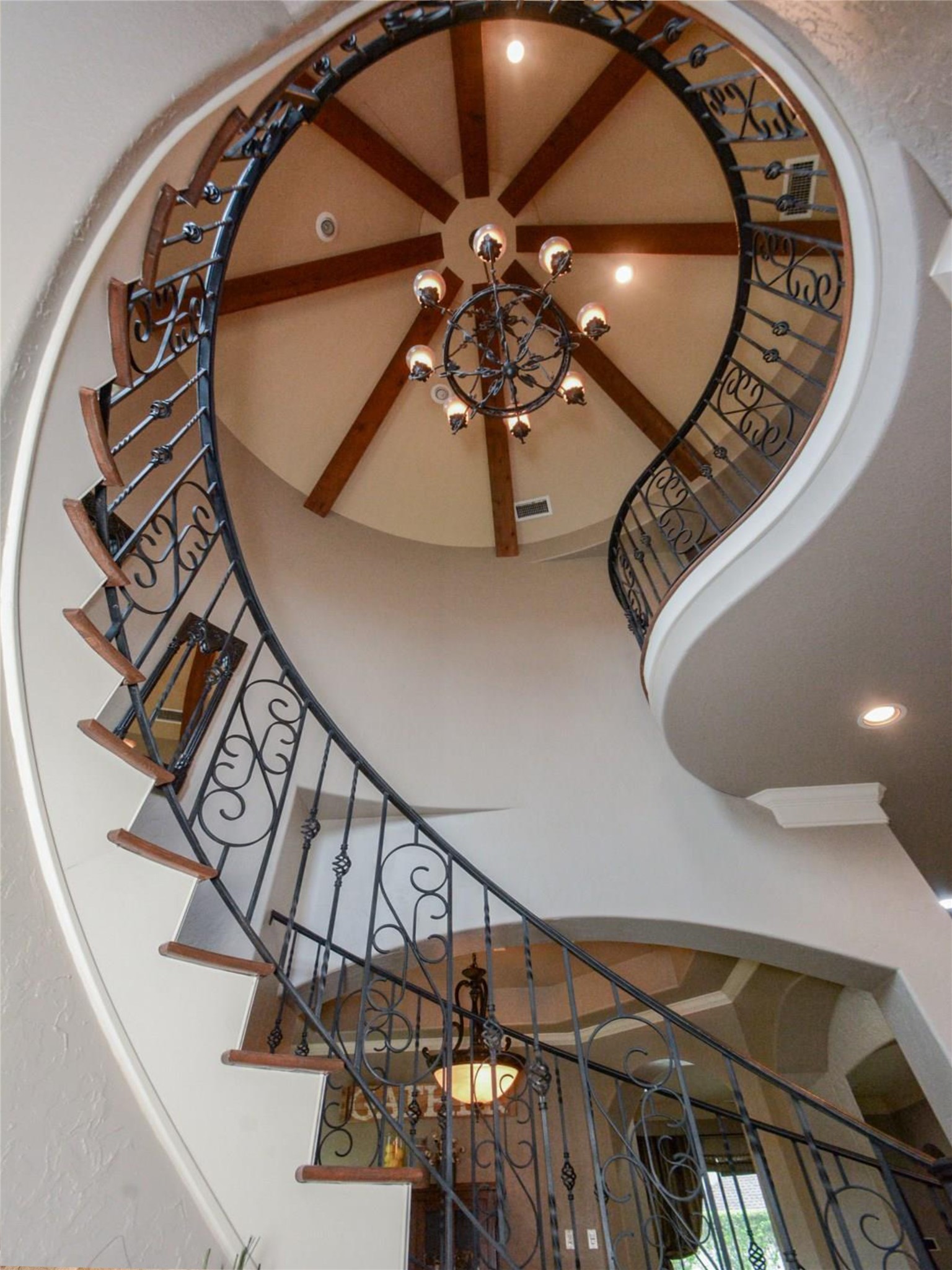 25207 Hideaway Run Drive Spring, TX 77389 - Photo 33 of 49 Look up at the turret ceiling with wood beams in the foyer