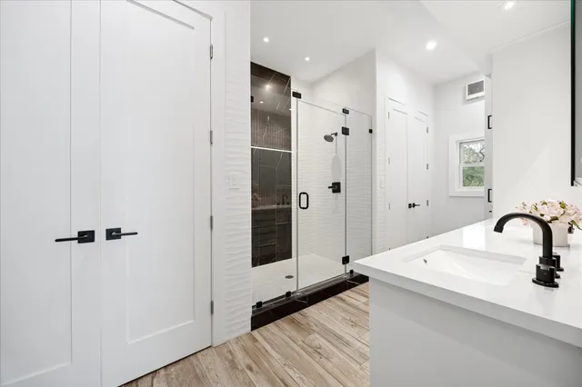 a view of a patio with table and chairs and a yard