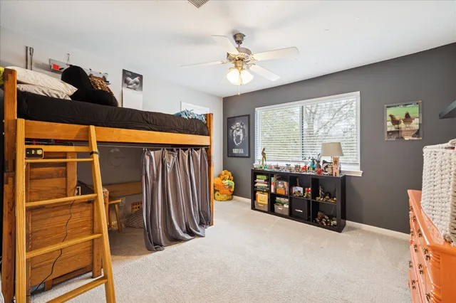 a room with a desk and a window