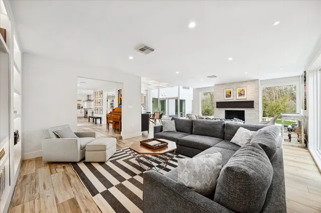 a view of yard with swimming pool and green space