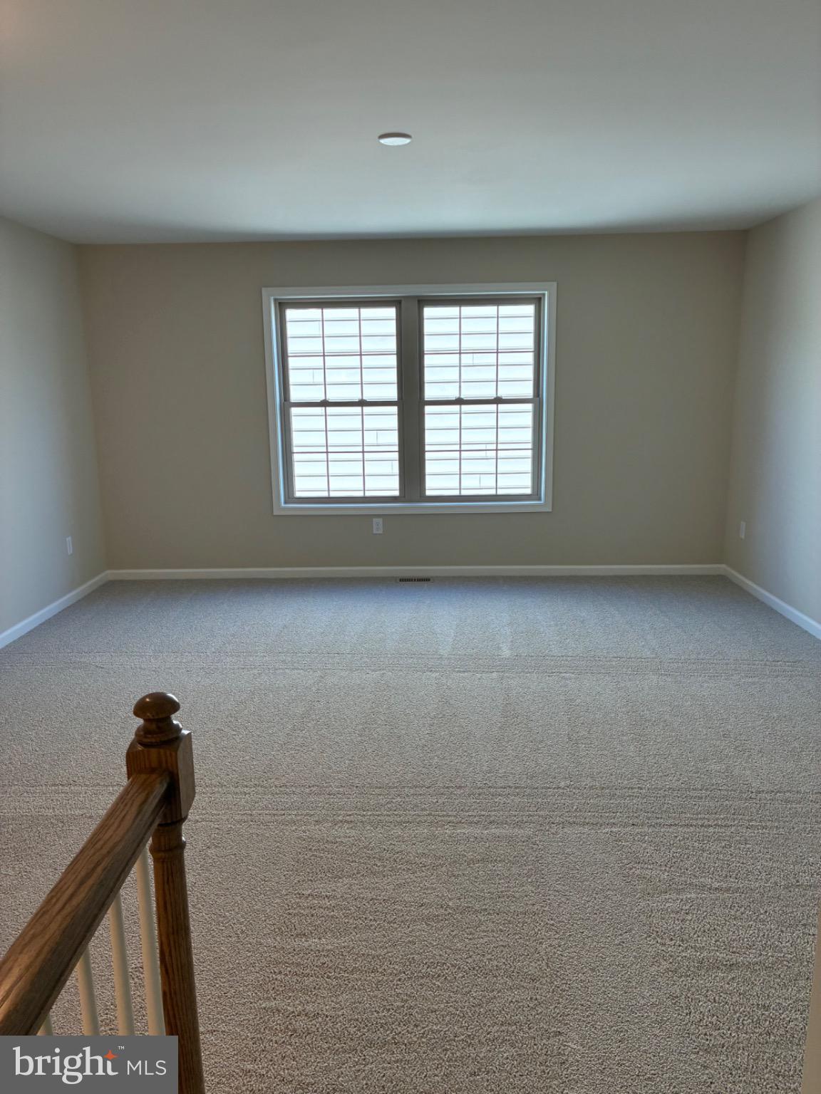 602 Greenbriar Path Cochranville, PA 19330 - Photo 17 of 20 a view of empty room with windows