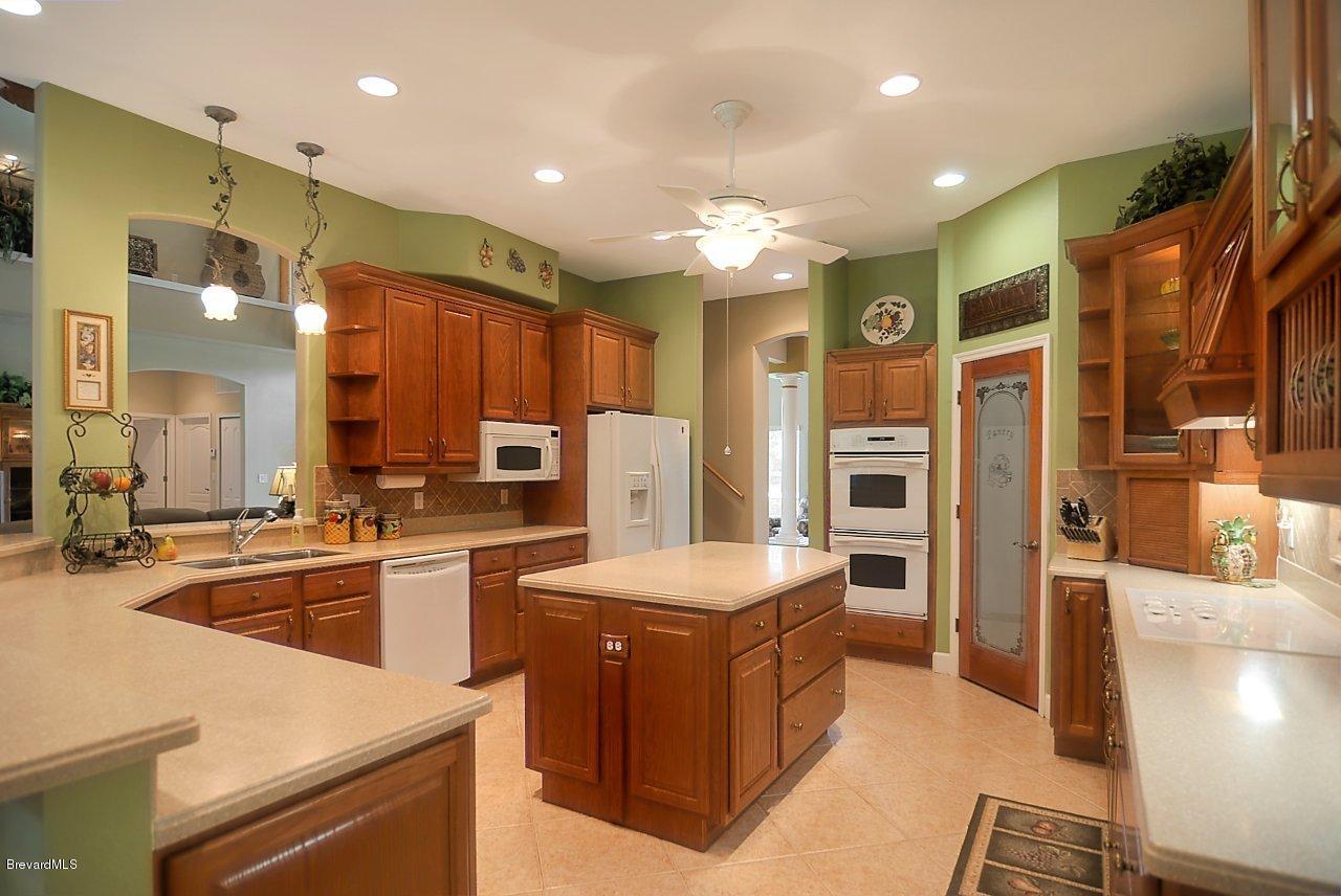 3199 Aurora Road Melbourne, FL 32934 - Photo 8 of 16 kitchen (2)