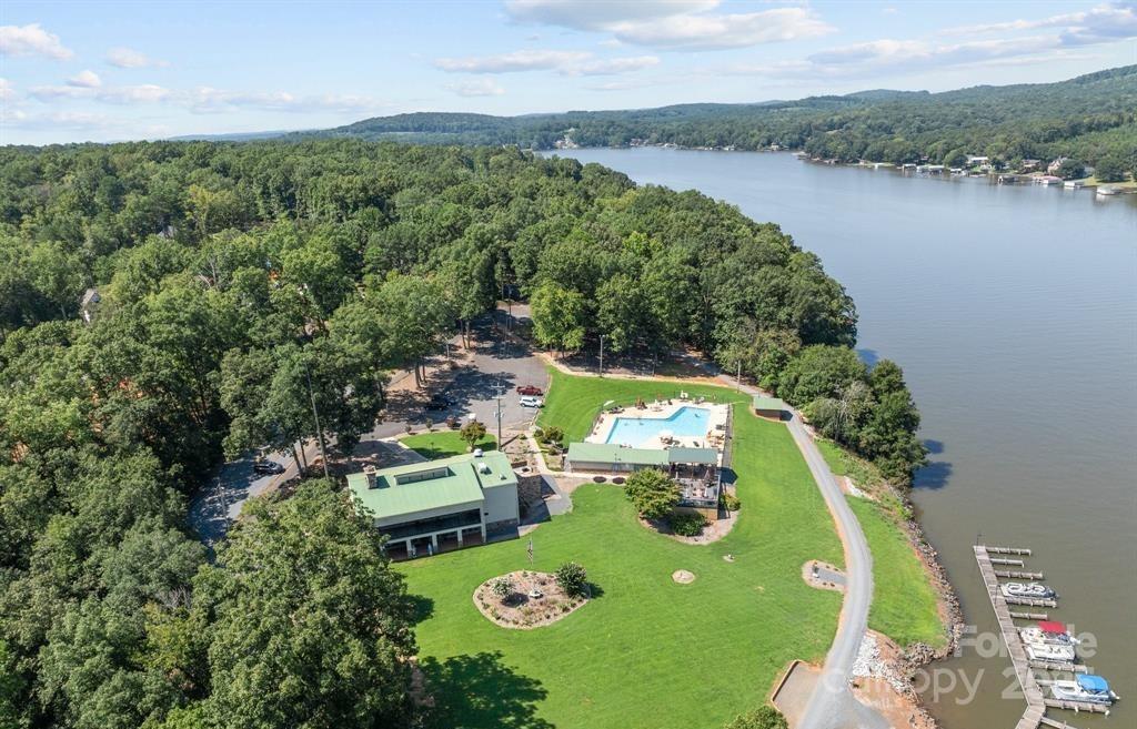 242 Creswell Road Mount Gilead, NC 27306 - Photo 18 of 20 an aerial view of a house with a lake view