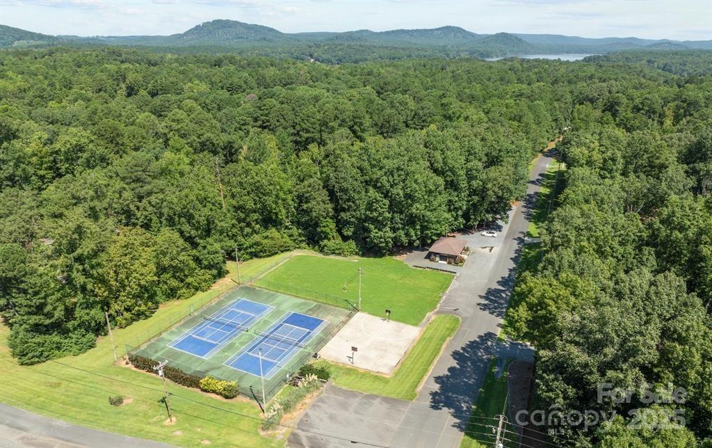 242 Creswell Road Mount Gilead, NC 27306 - Photo 20 of 20 a view of a yard with an outdoor seating