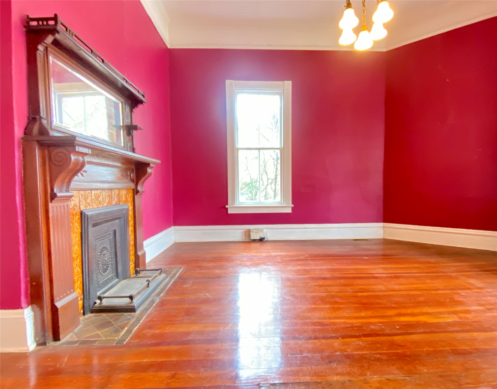 223 East Robert Toombs Avenue Washington, GA 30673 - Photo 17 of 46 a view of a livingroom with wooden floor and a fireplace