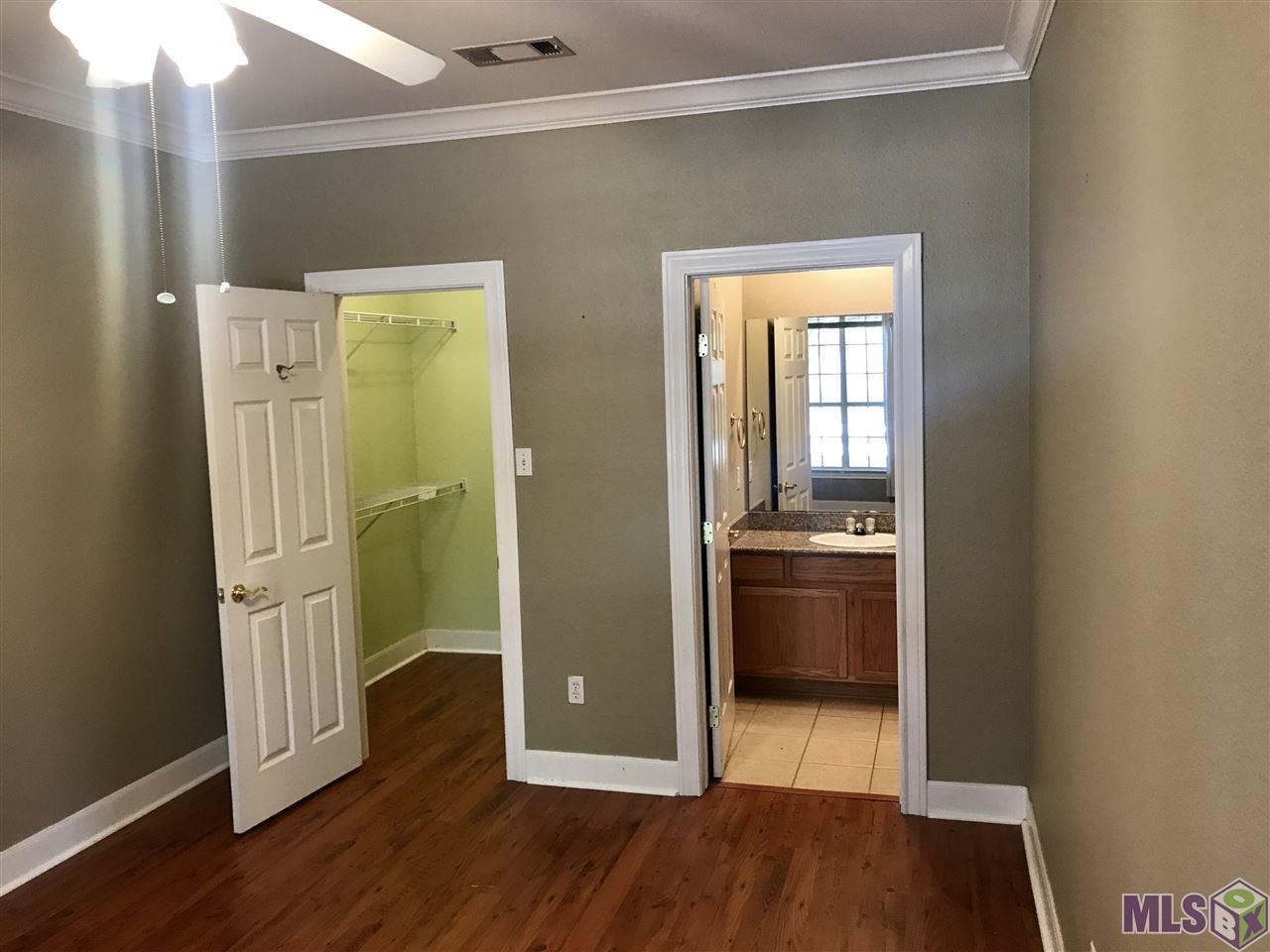 710 East Boyd Drive, Unit 406 Baton Rouge, LA 70808 - Photo 12 of 16 Walk In Closet and Bathroom
