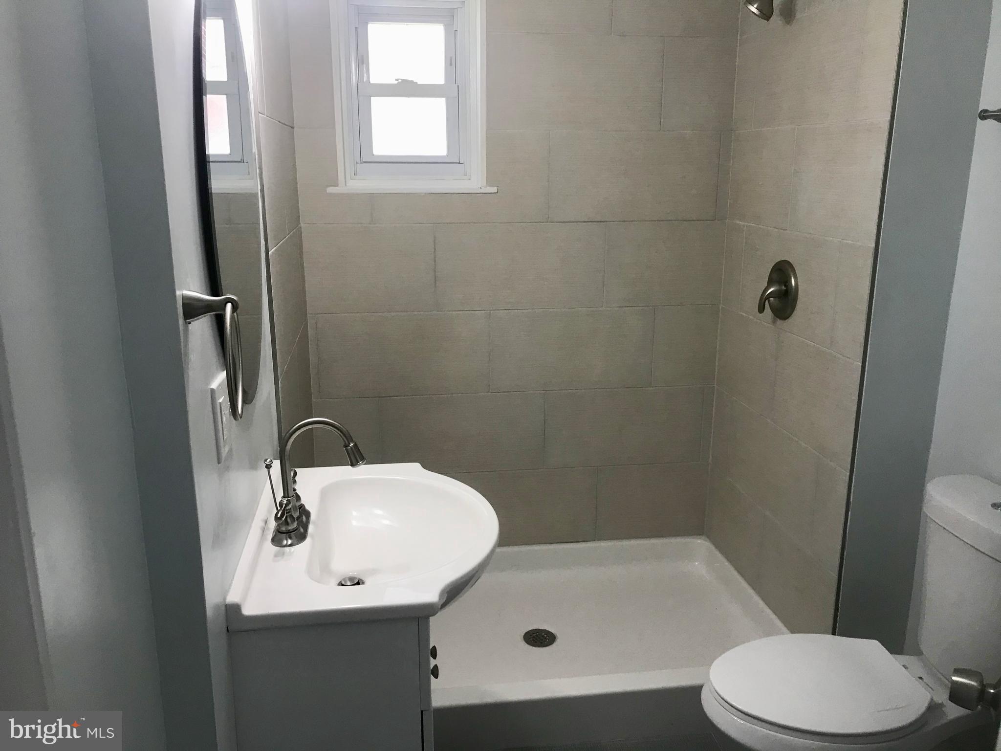 1115 Gregg Avenue Reading, PA 19607 - Photo 13 of 32 Bathroom - New Shower, sink, & toilet