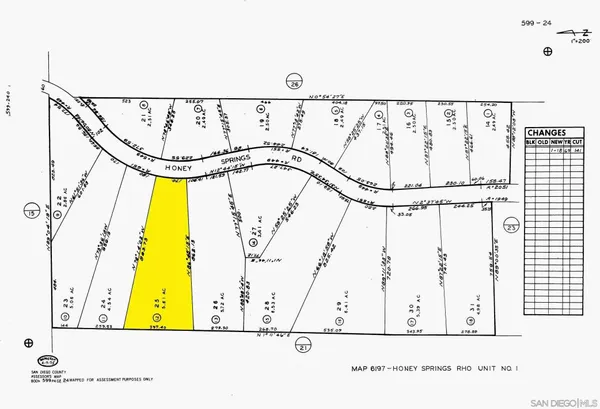 a black and white photo of a living room