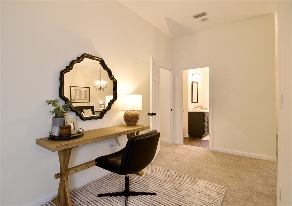 12 Rose Circle Hampden, MA 01036 - Photo 30 of 41 a room with furniture and a mirror