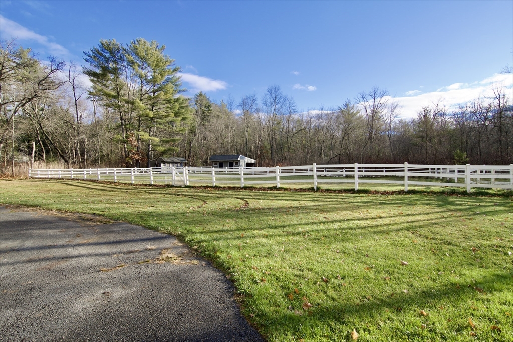12 Rose Circle Hampden, MA 01036 - Photo 40 of 41 a view of a swimming pool with a yard