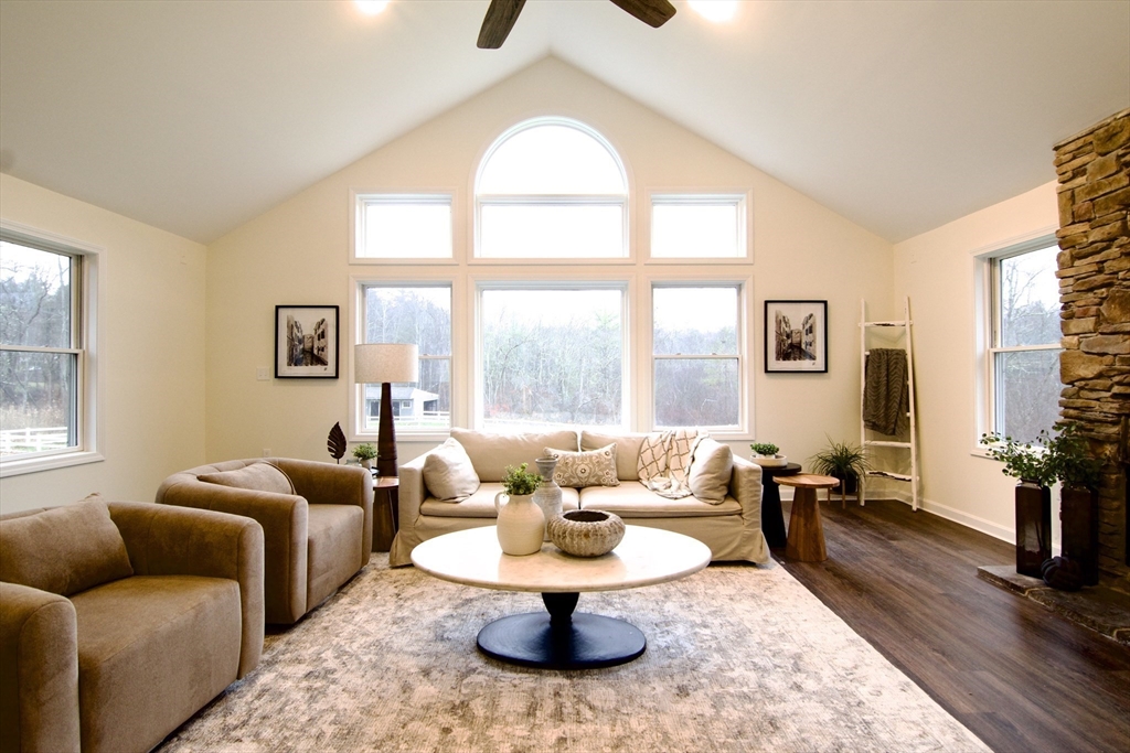 12 Rose Circle Hampden, MA 01036 - Photo 6 of 41 a living room with furniture a table and a large window