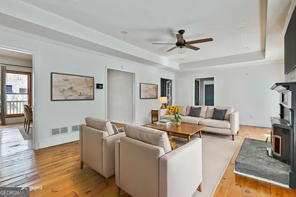 a kitchen with stainless steel appliances a sink stove and cabinets