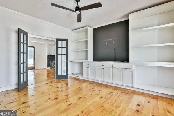 a kitchen that has a sink and a stove