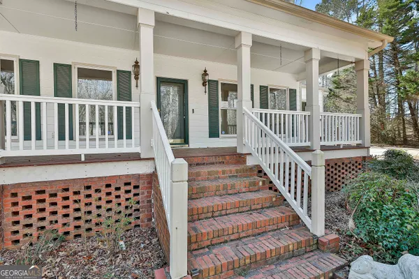 a picture of a room with a white wall and white walls