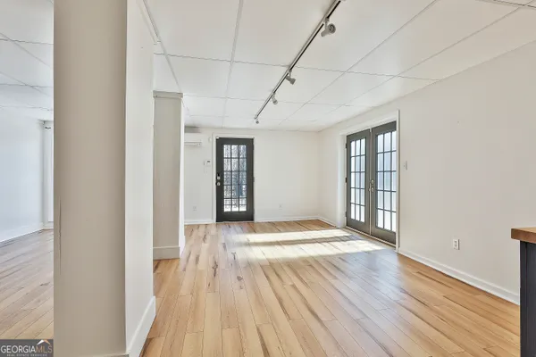 a view of backyard with a table and chairs