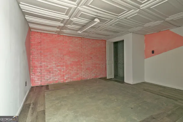 a view of a room with a garage