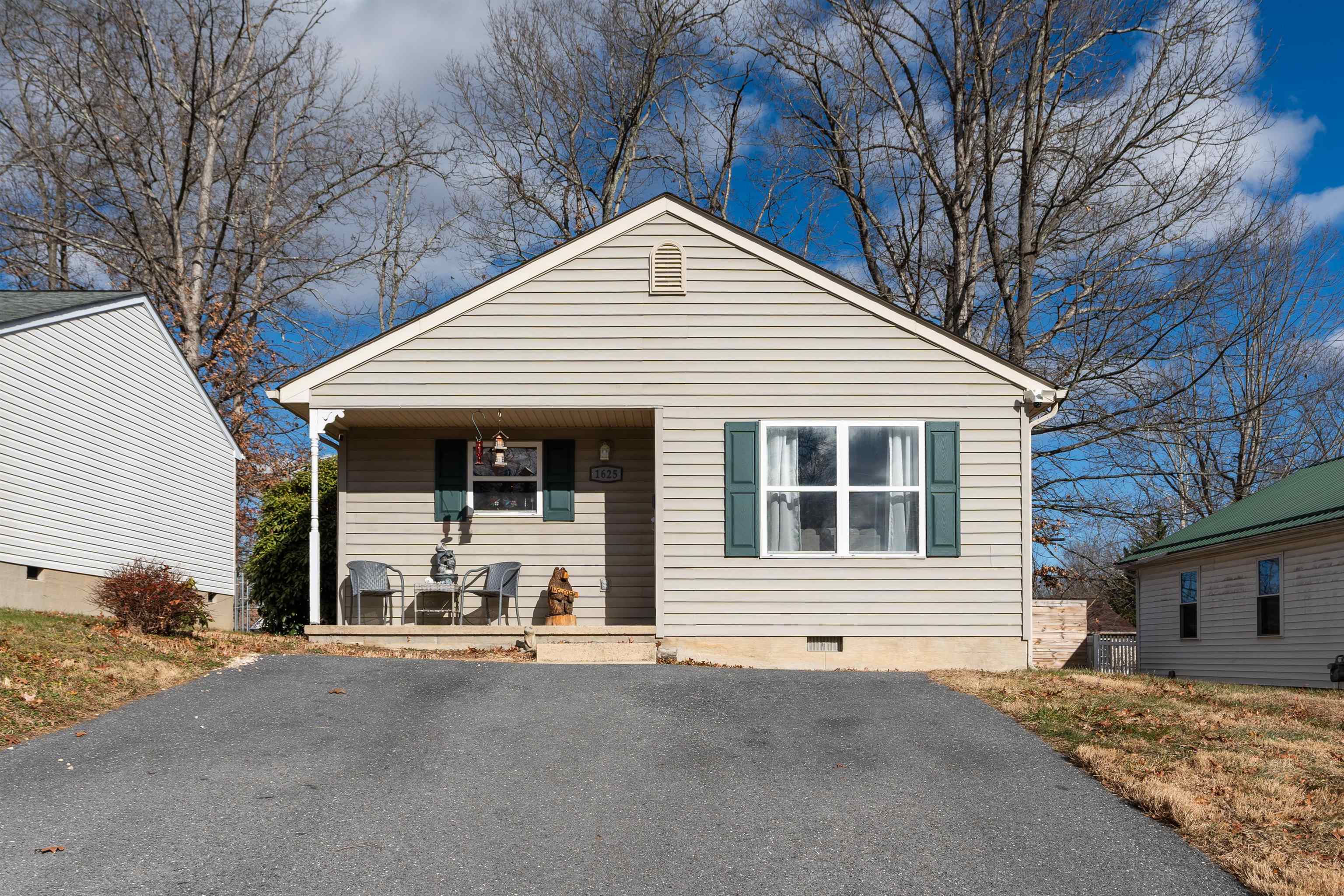 a front view of a house with a garage