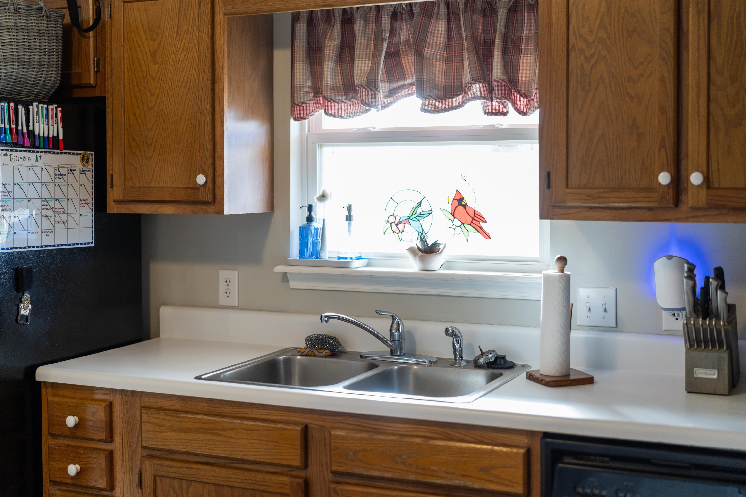 1625 D Street Waynesboro, VA 22980 - Photo 12 of 33 a kitchen with a sink and cabinets