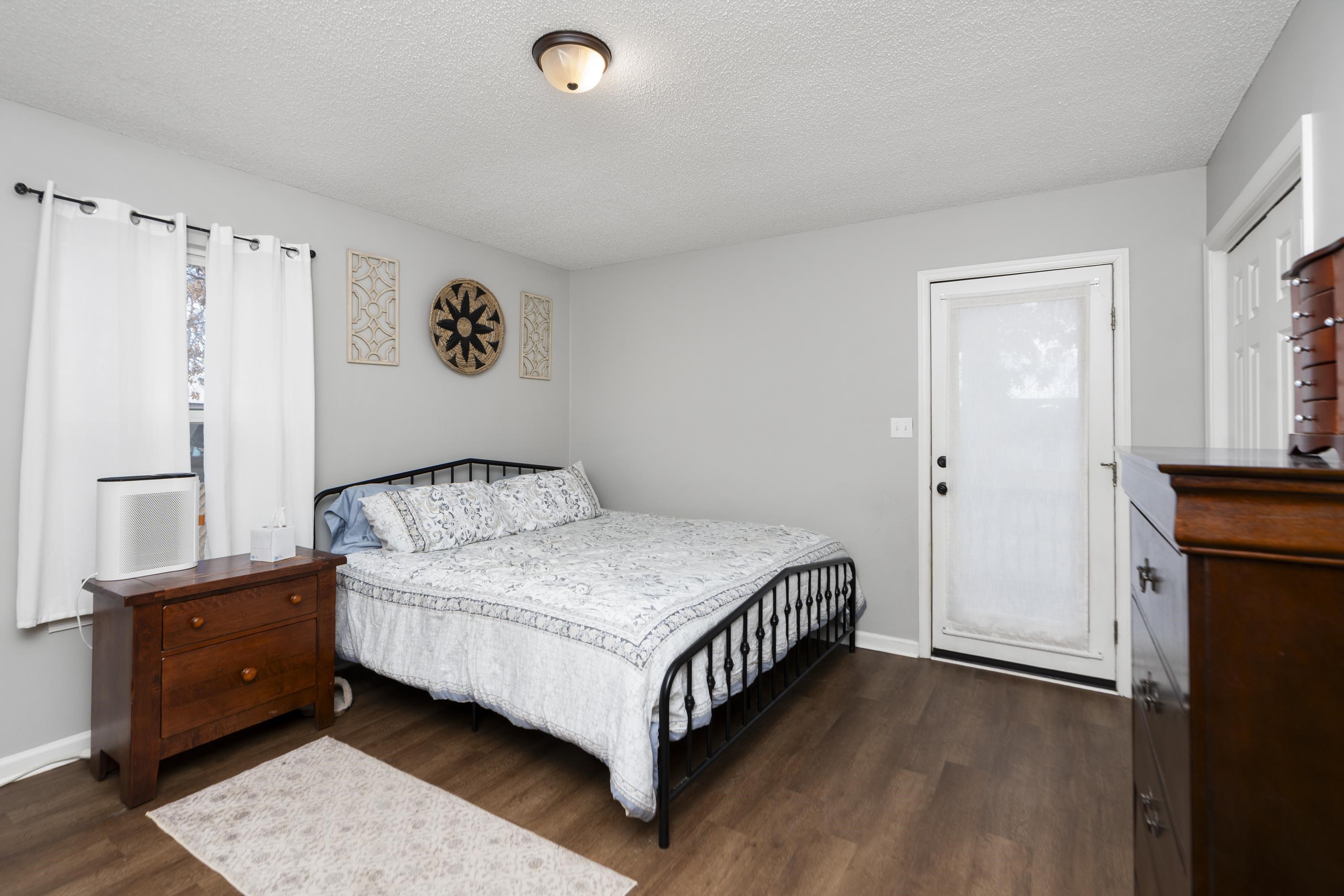 1625 D Street Waynesboro, VA 22980 - Photo 16 of 33 a spacious bedroom with a bed and a window