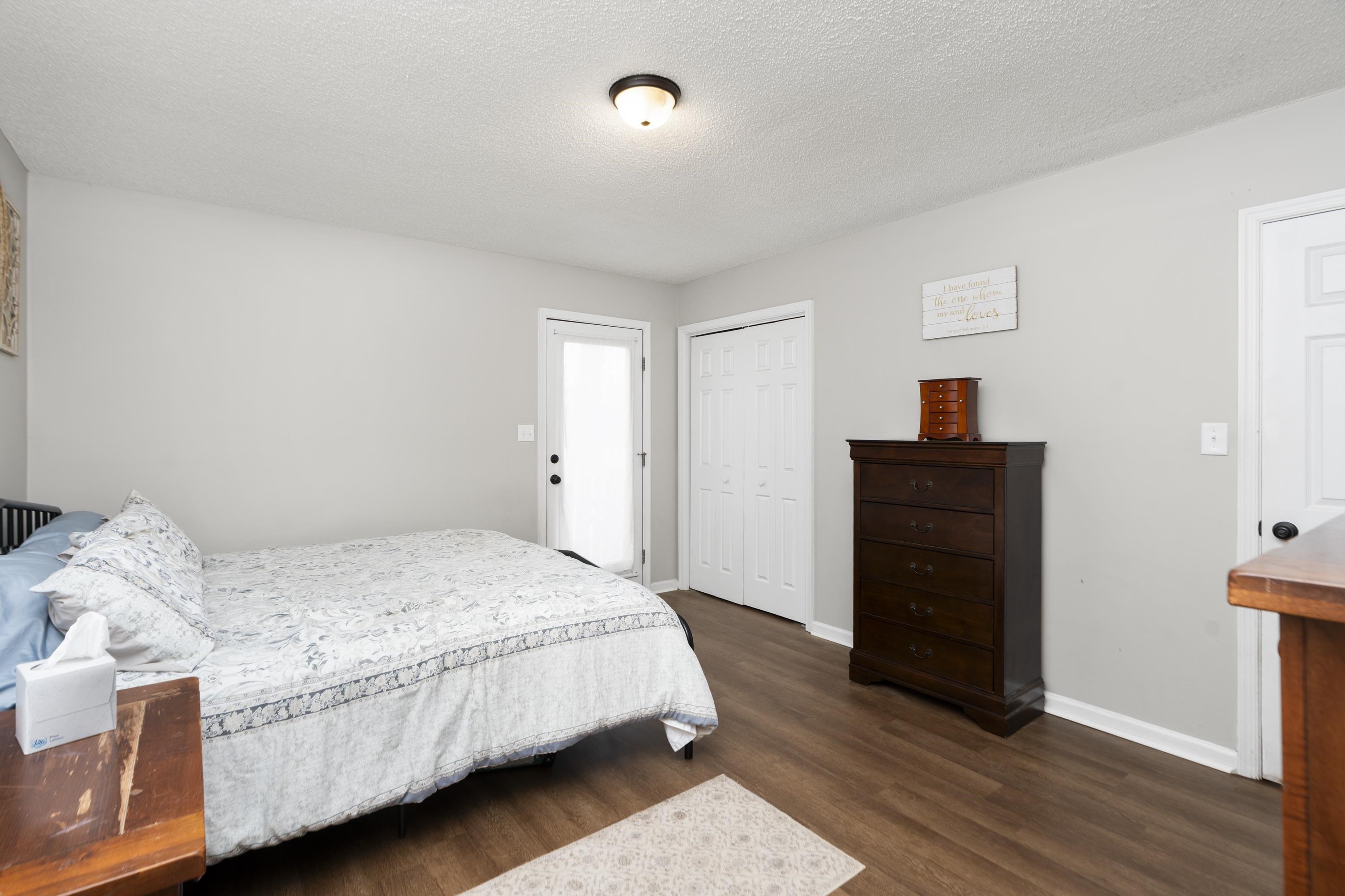 1625 D Street Waynesboro, VA 22980 - Photo 17 of 33 a bedroom with a bed and a dresser