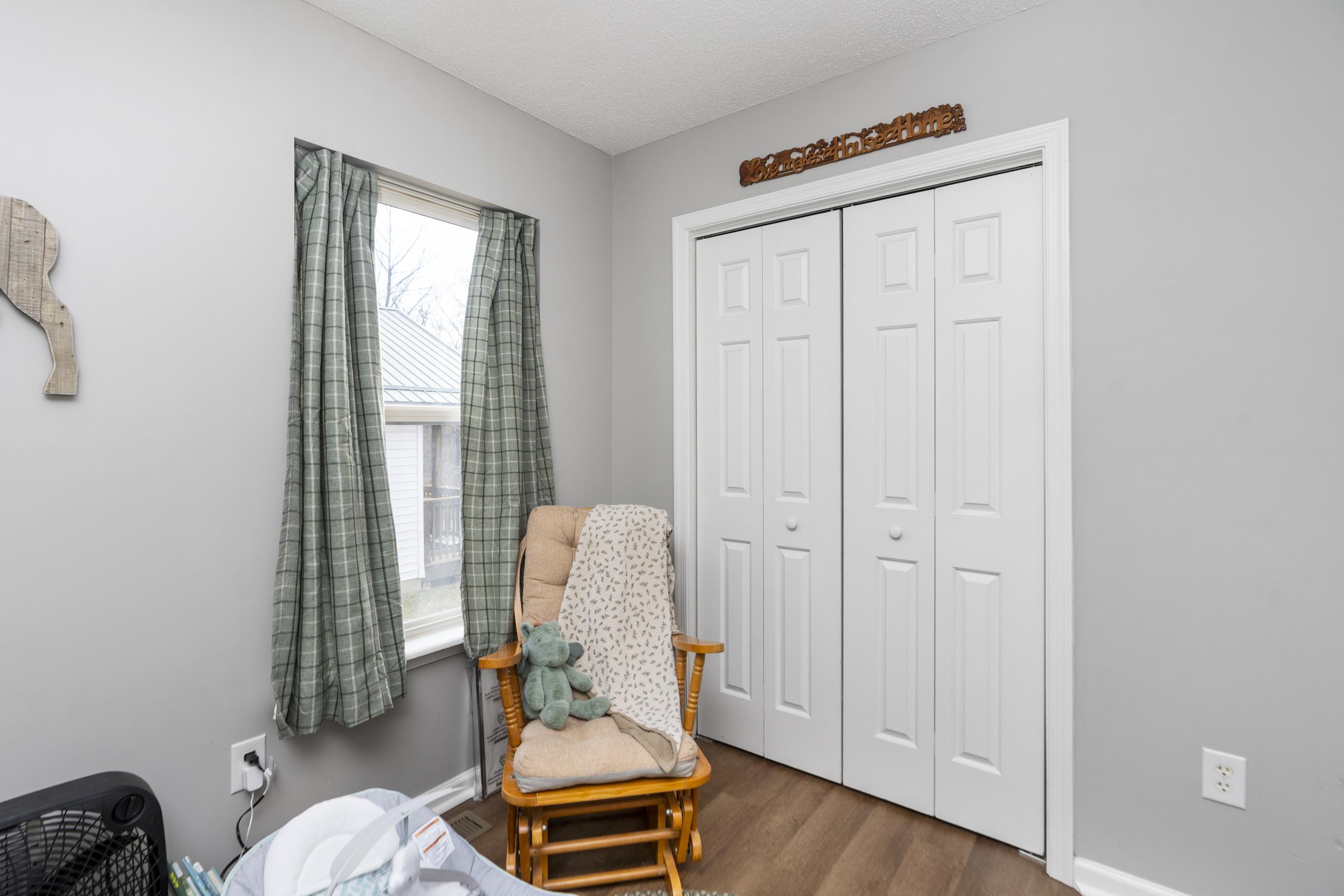 1625 D Street Waynesboro, VA 22980 - Photo 21 of 33 a living room with furniture and a gate