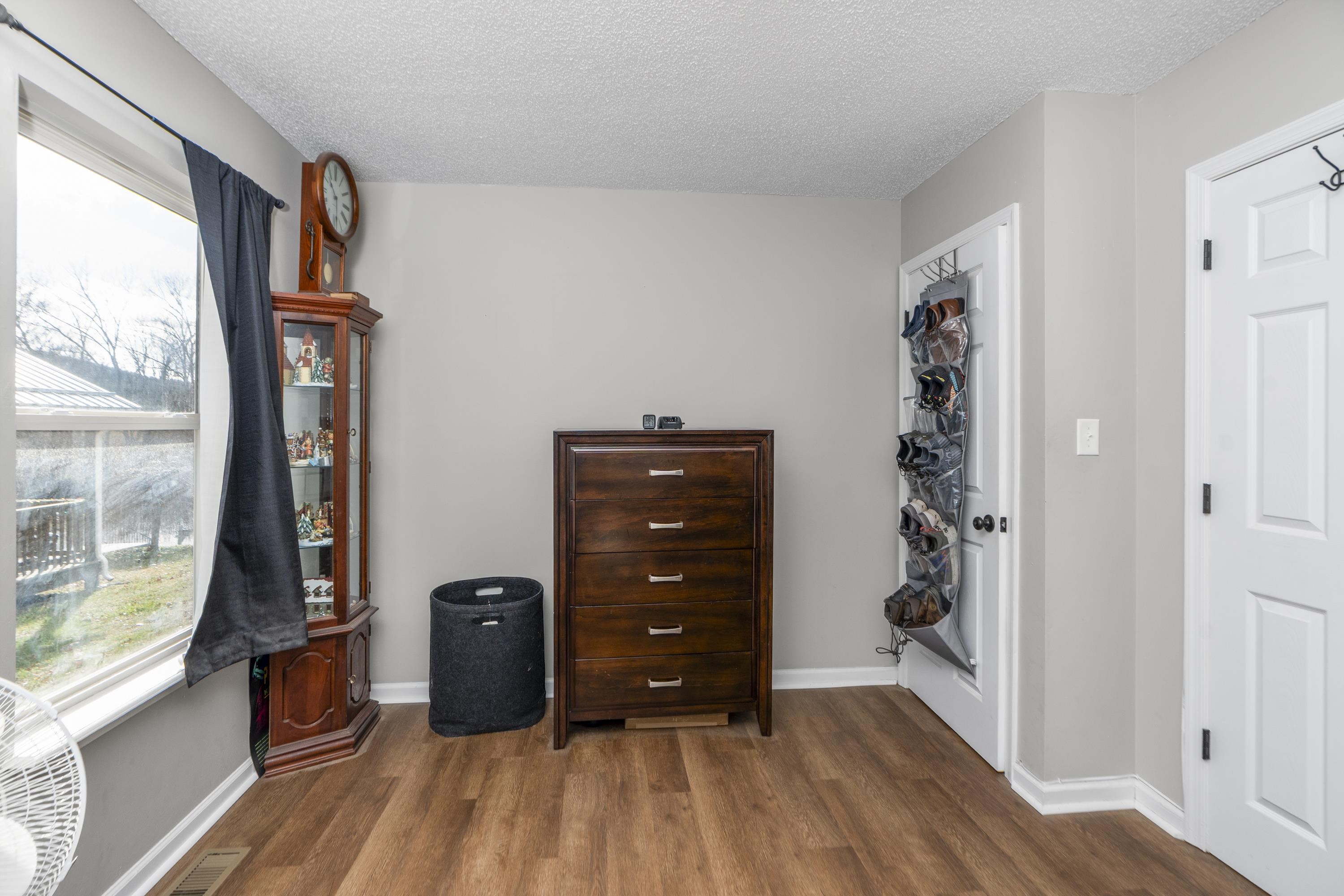 1625 D Street Waynesboro, VA 22980 - Photo 25 of 33 wooden floor in a livingroom with a large window