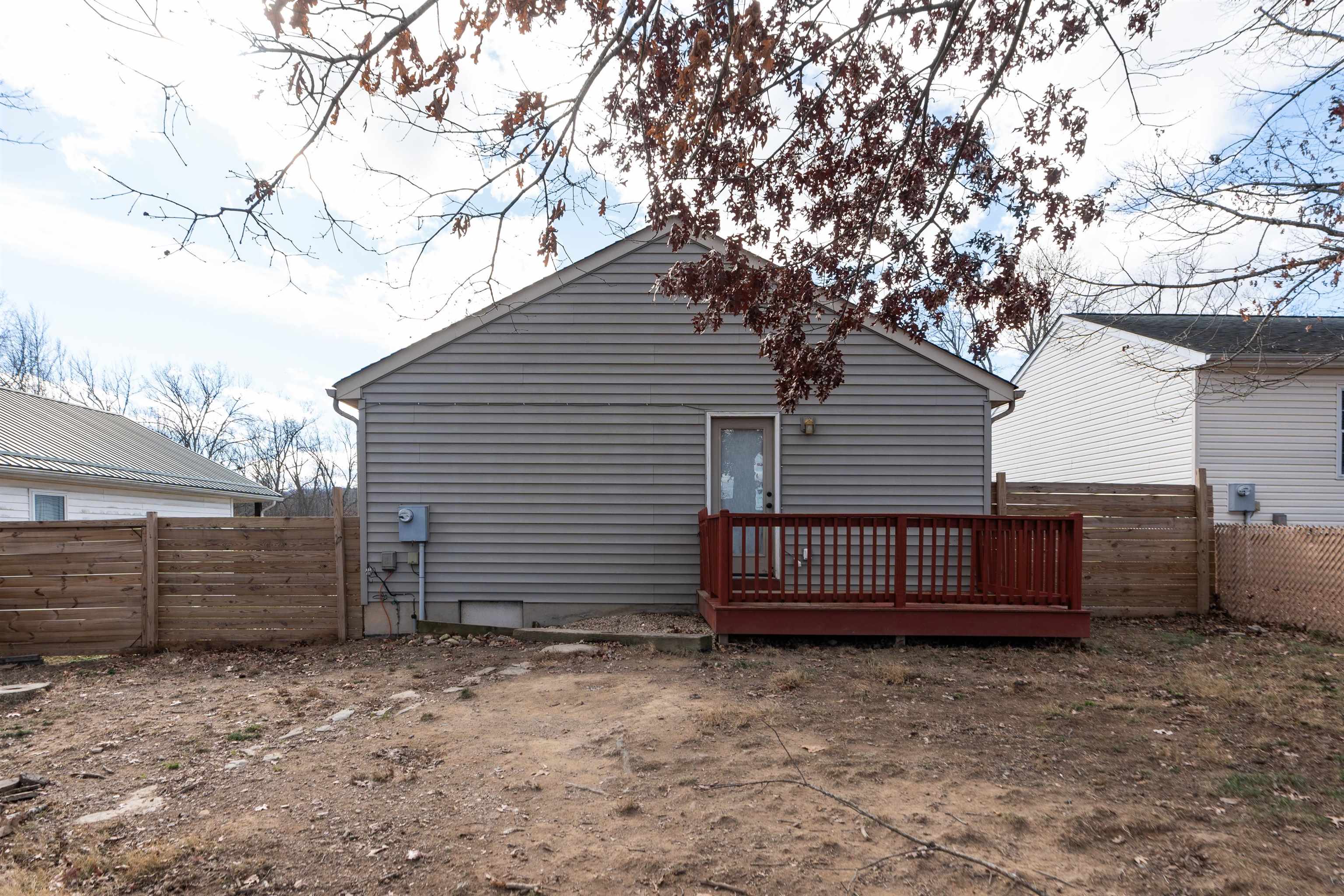 1625 D Street Waynesboro, VA 22980 - Photo 26 of 33 a view of a house with a yard and wooden fence